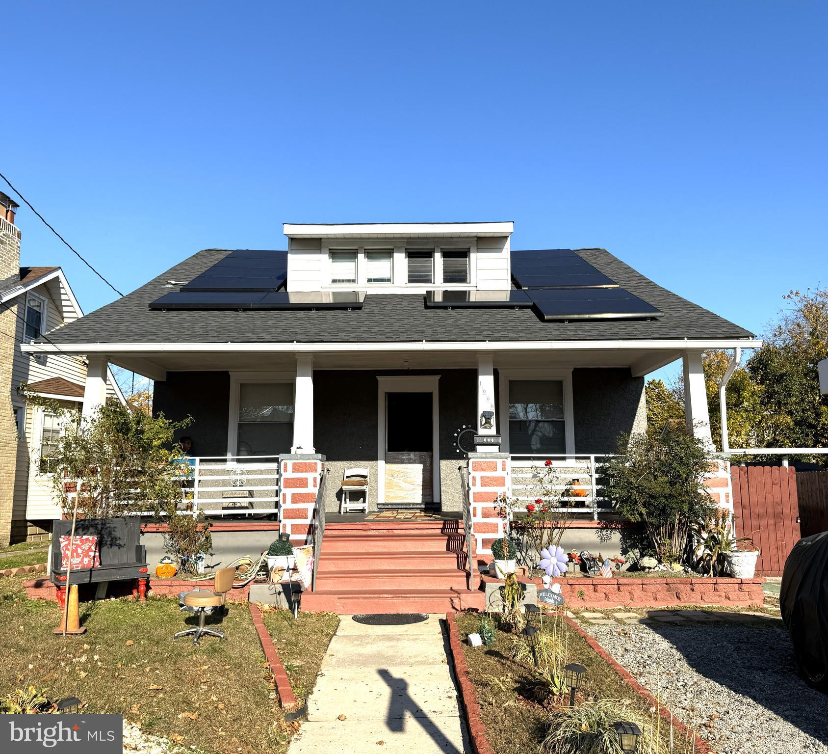 1666 Browning Road Pennsauken, NJ 08110 - Photo 1 of 12 a front view of a house with patio
