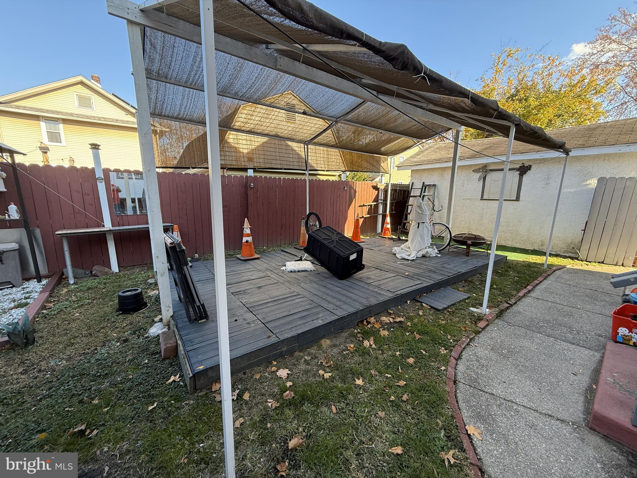 1666 Browning Road Pennsauken, NJ 08110 - Photo 11 of 12 a view of a backyard with wooden floor and a iron fence