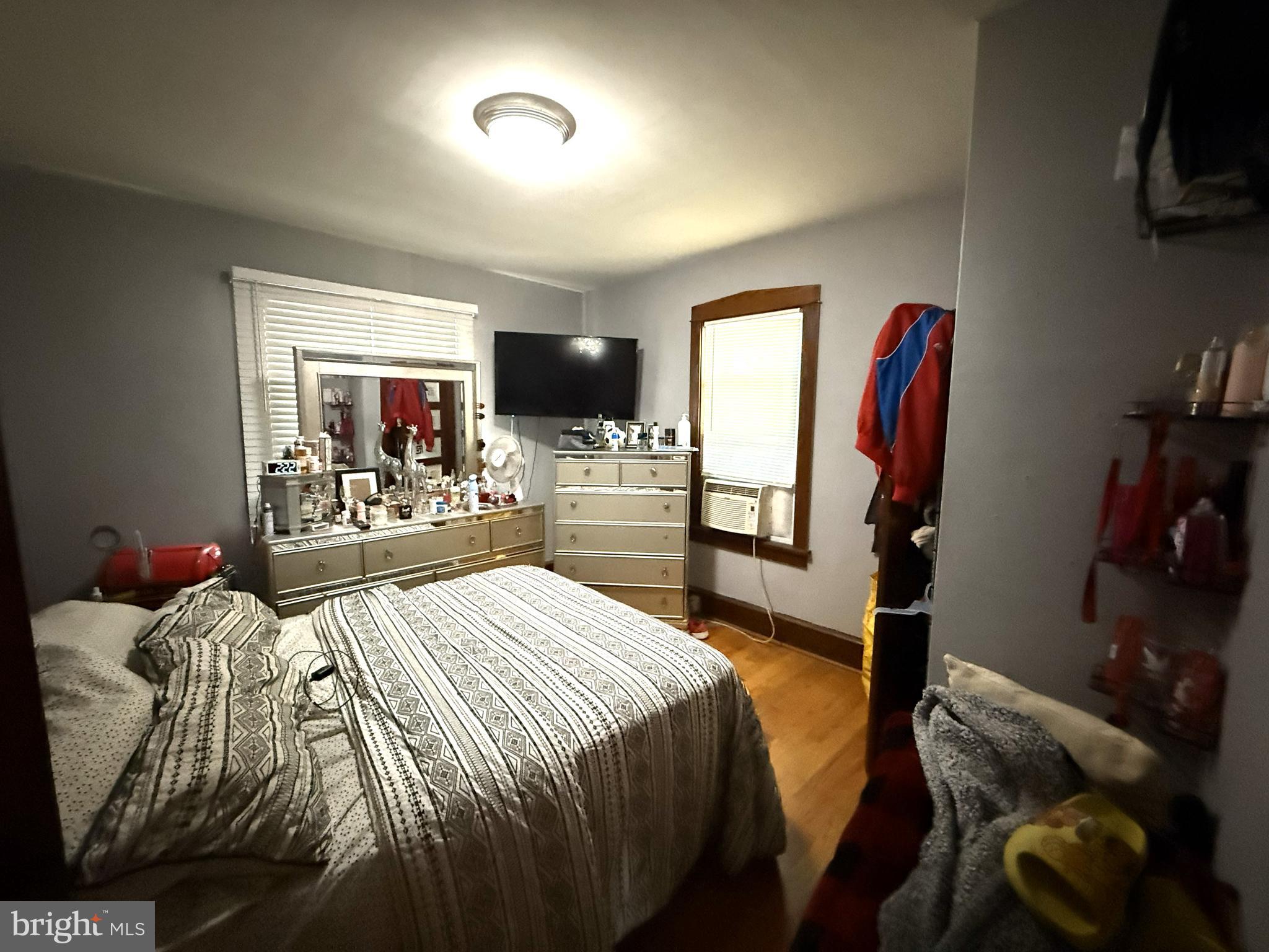 1666 Browning Road Pennsauken, NJ 08110 - Photo 5 of 12 a bedroom with a bed and a flat tv screen on dresser
