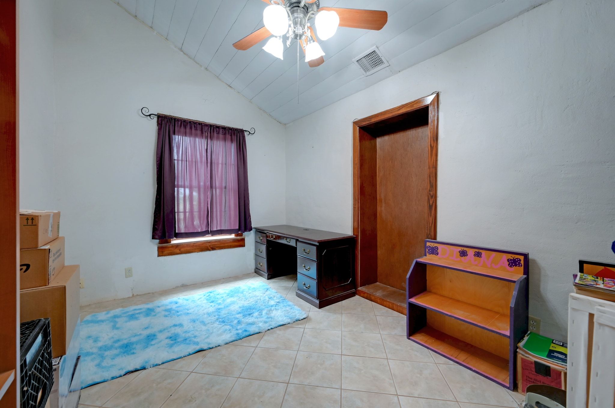 4598 Highway 173 Devine, TX 78016 - Photo 16 of 40 Office with vaulted ceiling, tile patterned floors, and a ceiling fan