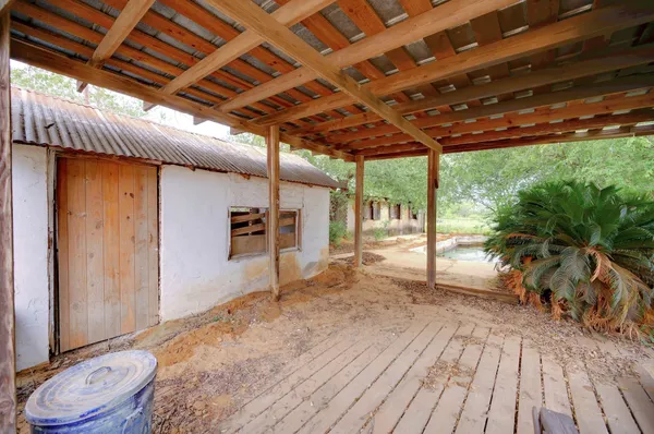 a view of a lake with houses in the back