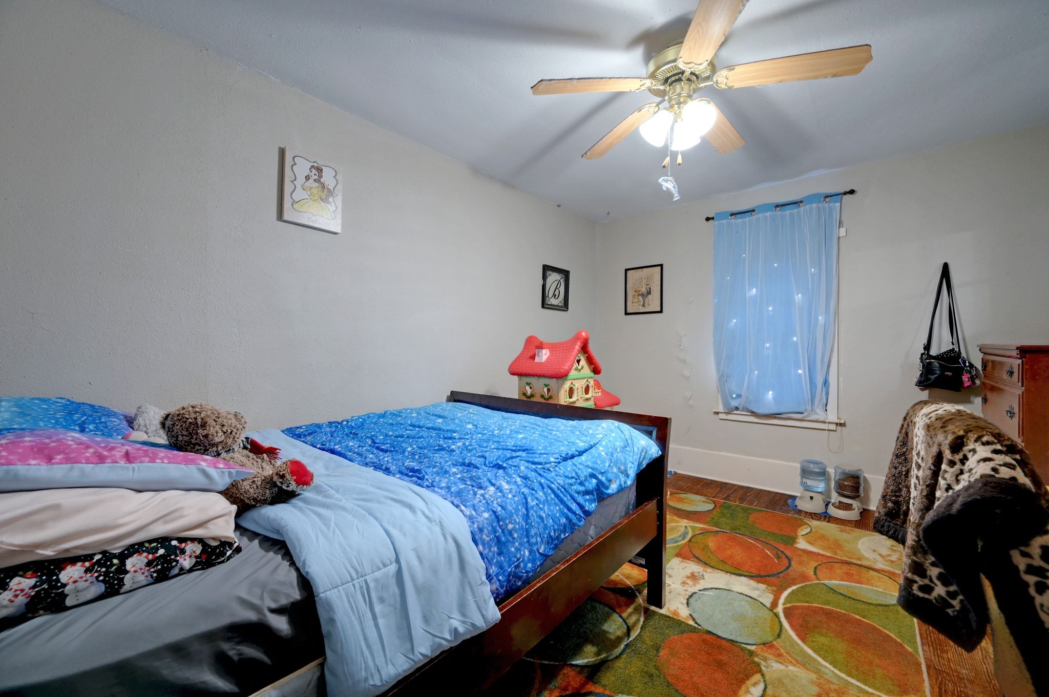 4598 Highway 173 Devine, TX 78016 - Photo 31 of 40 Bedroom with wood finished floors and ceiling fan