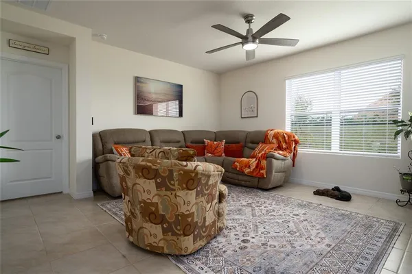 a bedroom with a bed and a night stand