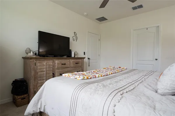 a bathroom with a sink a mirror and a shower