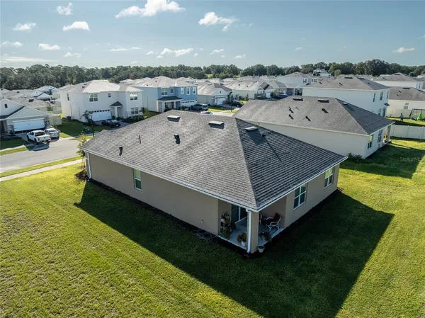 a view of a swimming pool with seating area