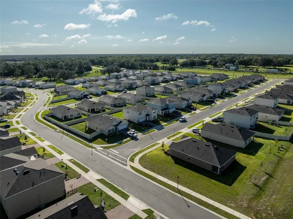 a view of front of house with a yard