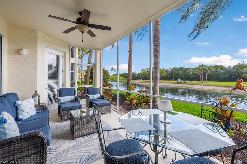 4650 Winged Foot Court, Unit 102 Naples, FL 34112 - Photo 21 of 34 Sunroom / solarium featuring a water view and ceiling fan