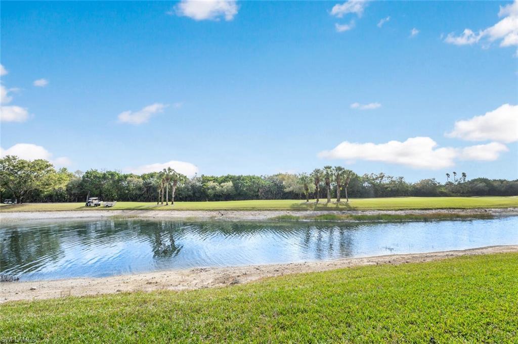 4650 Winged Foot Court, Unit 102 Naples, FL 34112 - Photo 27 of 34 Property view of water