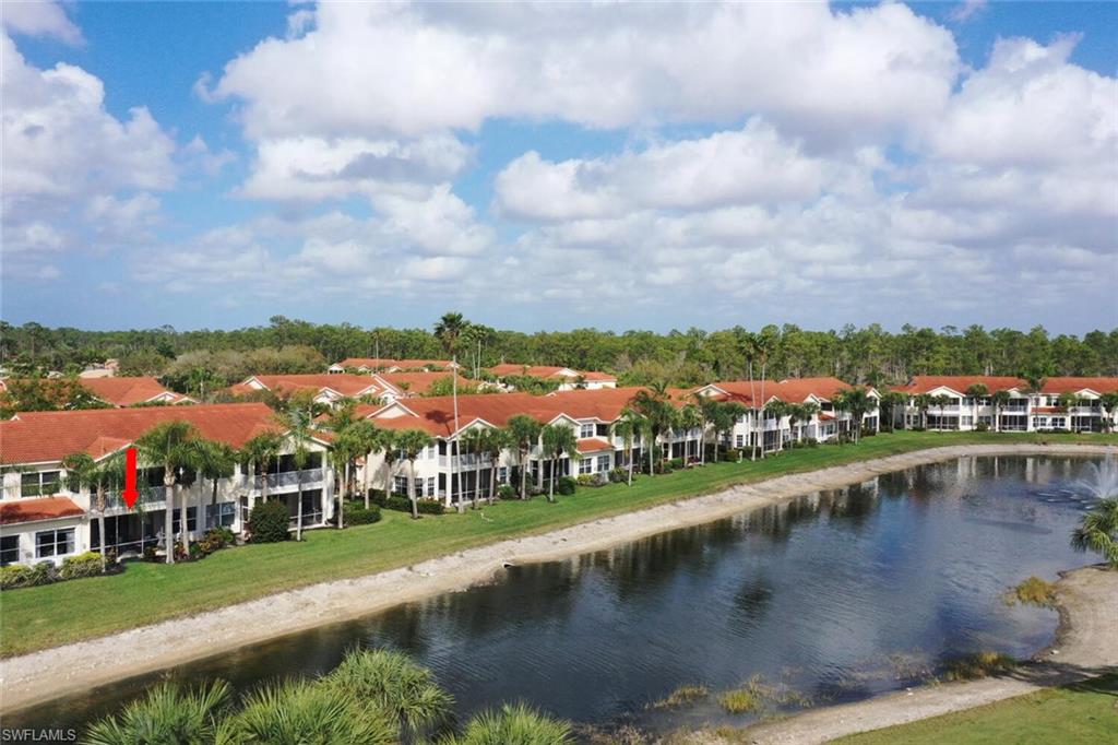4650 Winged Foot Court, Unit 102 Naples, FL 34112 - Photo 32 of 34 Water view featuring a residential view