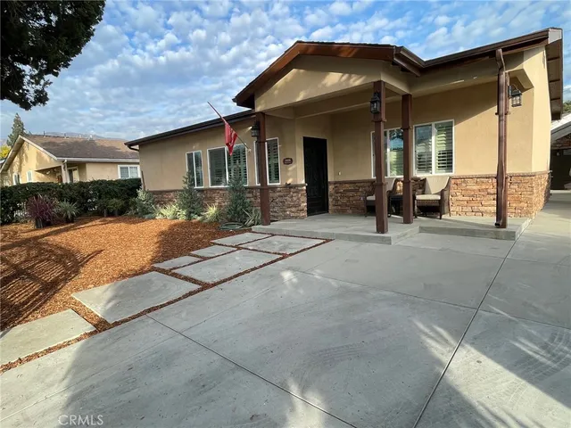 a view of a house with a patio