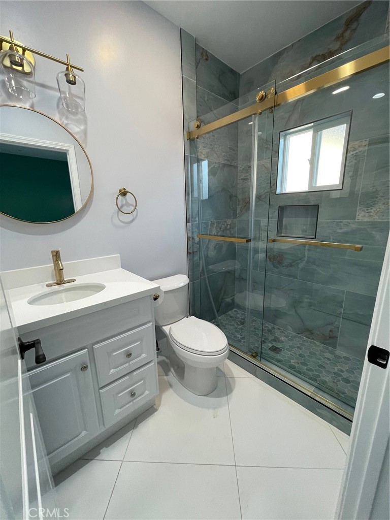 1838 Wardell Avenue Duarte, CA 91010 - Photo 5 of 14 a bathroom with a toilet sink and mirror