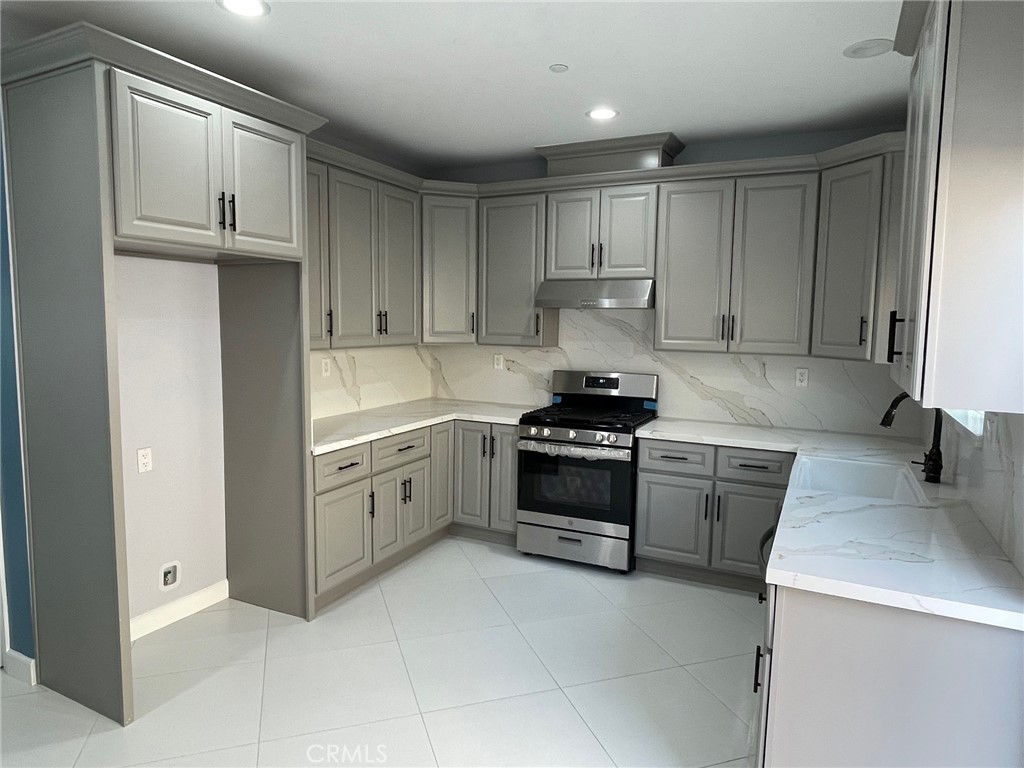 1838 Wardell Avenue Duarte, CA 91010 - Photo 10 of 14 a kitchen with stainless steel appliances granite countertop a stove and a refrigerator