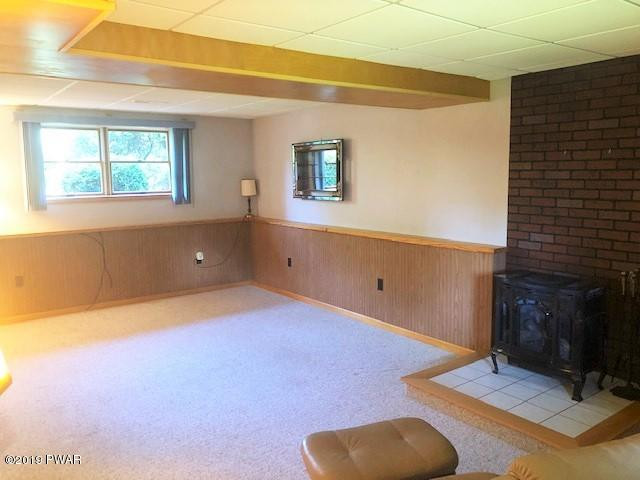 161 Tuthill Road Waymart, PA 18472 - Photo 22 of 31 a view of a livingroom with furniture and a ceiling fan