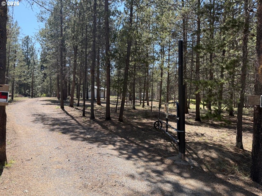 51377 Mitchell Road La Pine, OR 97739 - Photo 2 of 15 a view of outdoor space with trees