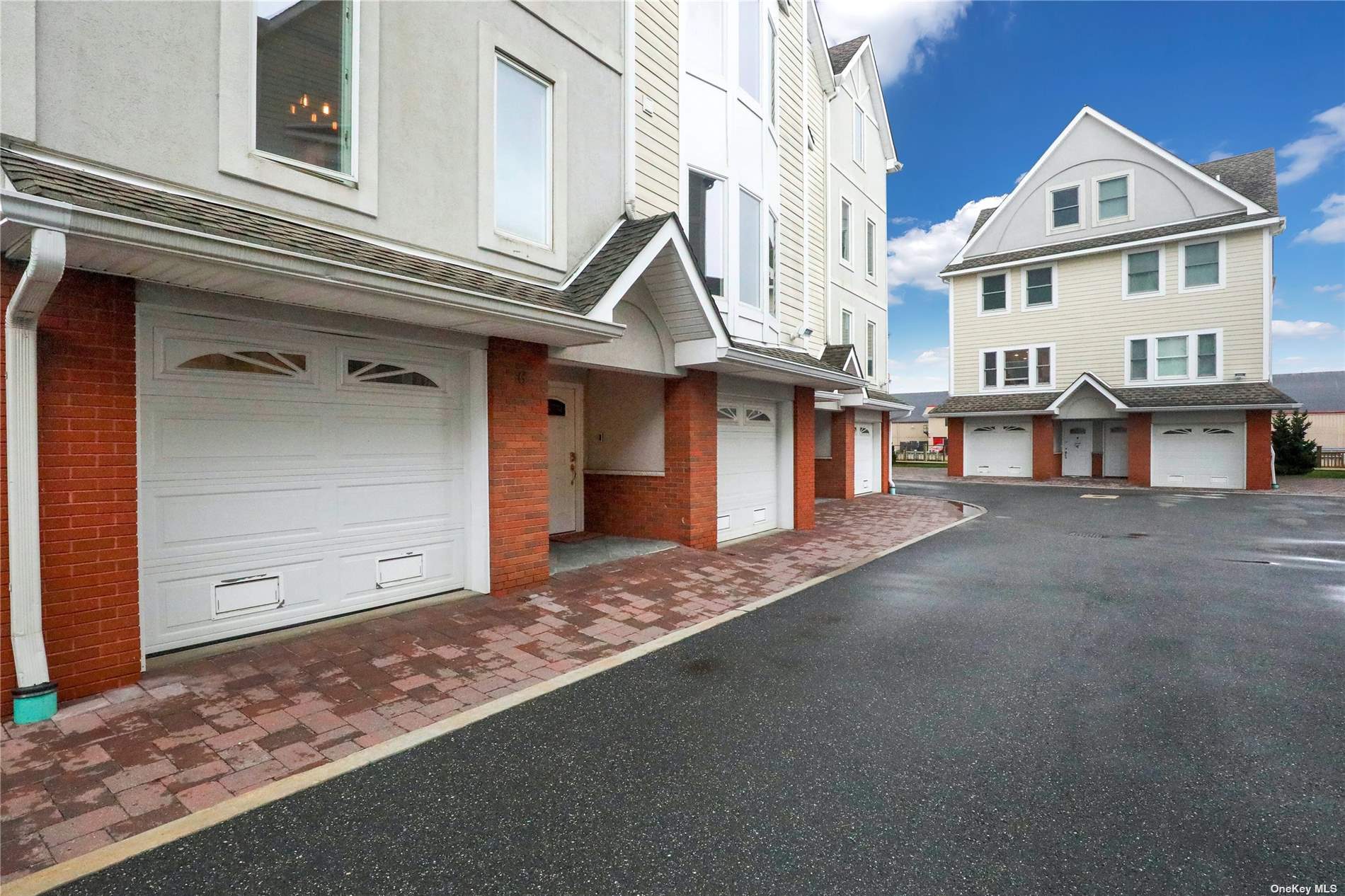 531 Ray Street, Unit 6 Freeport, NY 11520 - Photo 1 of 1 a view of a house with a street