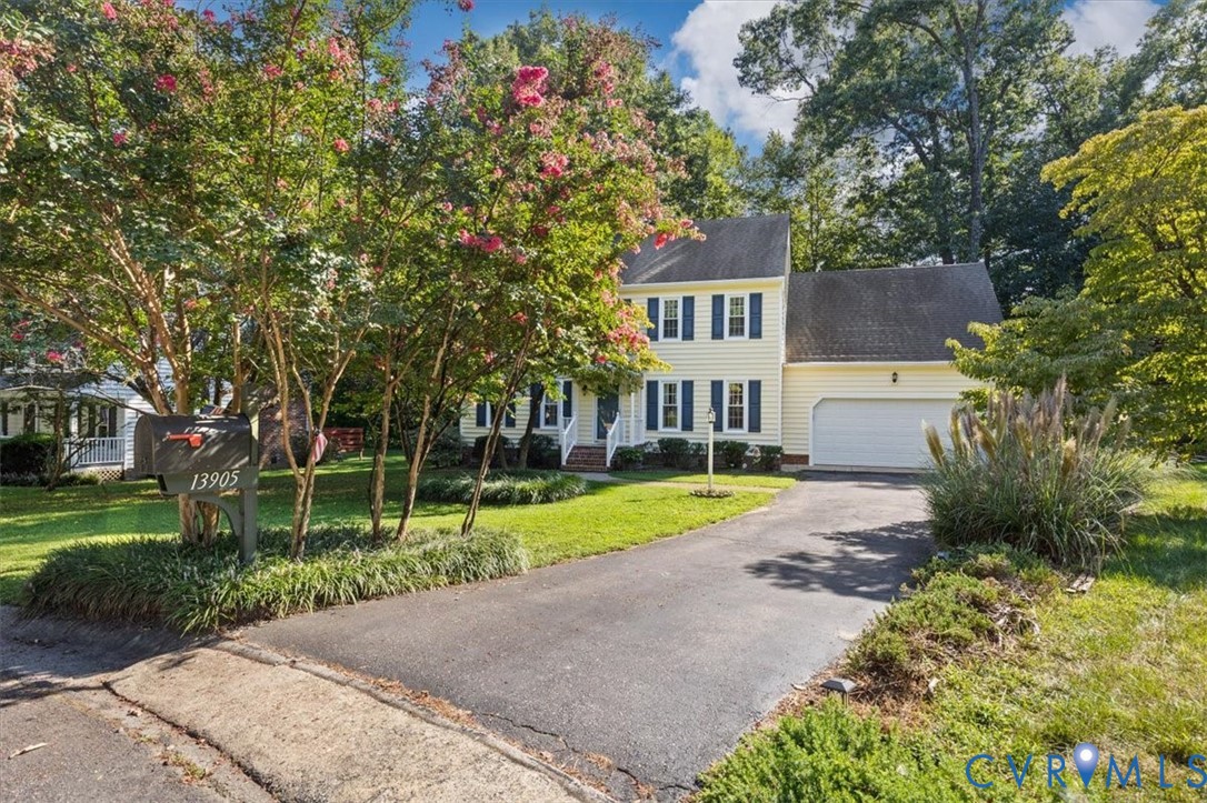 13905 Shadow Ridge Lane Midlothian, VA 23112 - Photo 2 of 55 Two-story residence with light yellow siding and a
