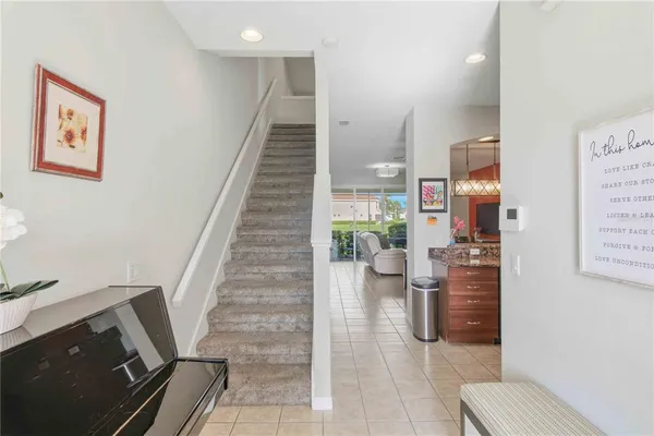 a kitchen with stainless steel appliances granite countertop a stove sink and cabinets