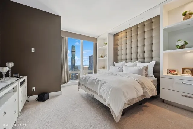 a bed room with a bed and a window