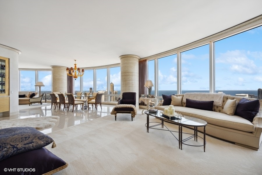 401 North Wabash Avenue, Unit 48A Chicago, IL 60611 - Photo 3 of 50 a living room with furniture and large windows