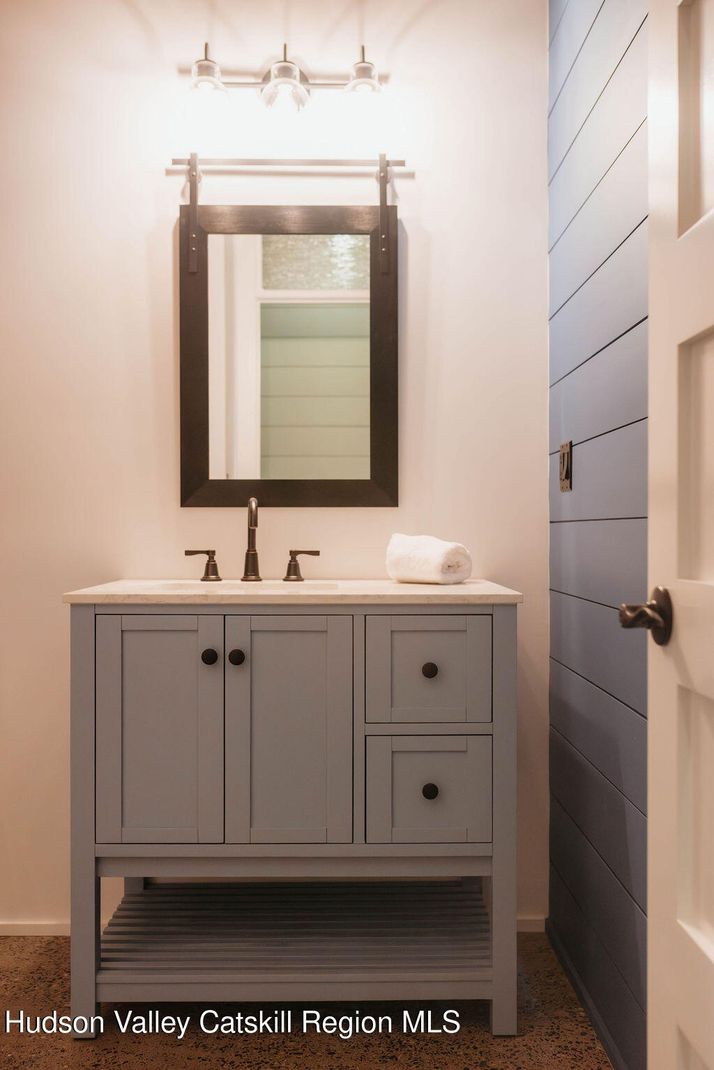 1248 Albany Post Road Gardiner, NY 12525 - Photo 18 of 44 a bathroom with a sink vanity and a mirror