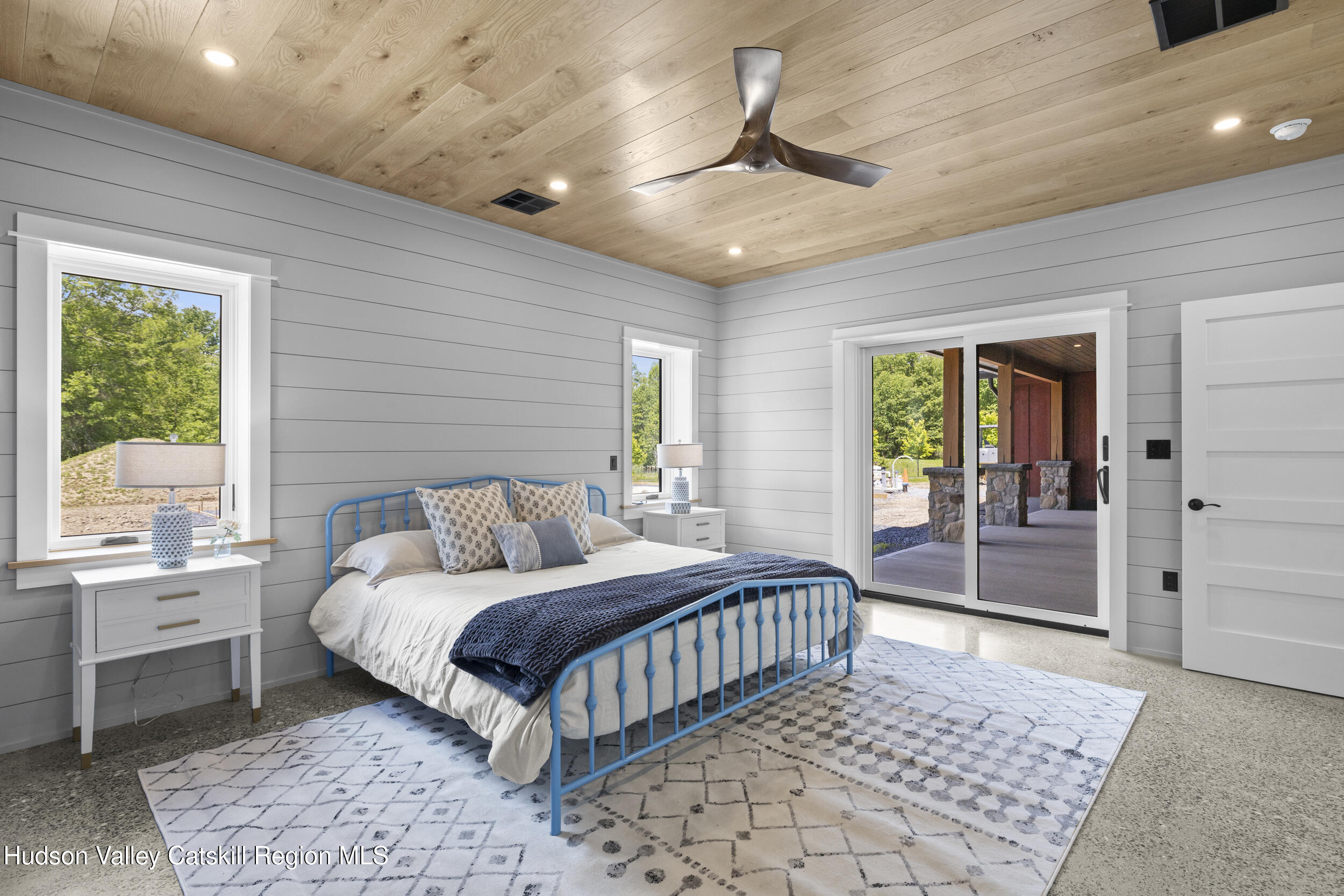 1248 Albany Post Road Gardiner, NY 12525 - Photo 20 of 44 a bedroom with a large bed chandelier and a window