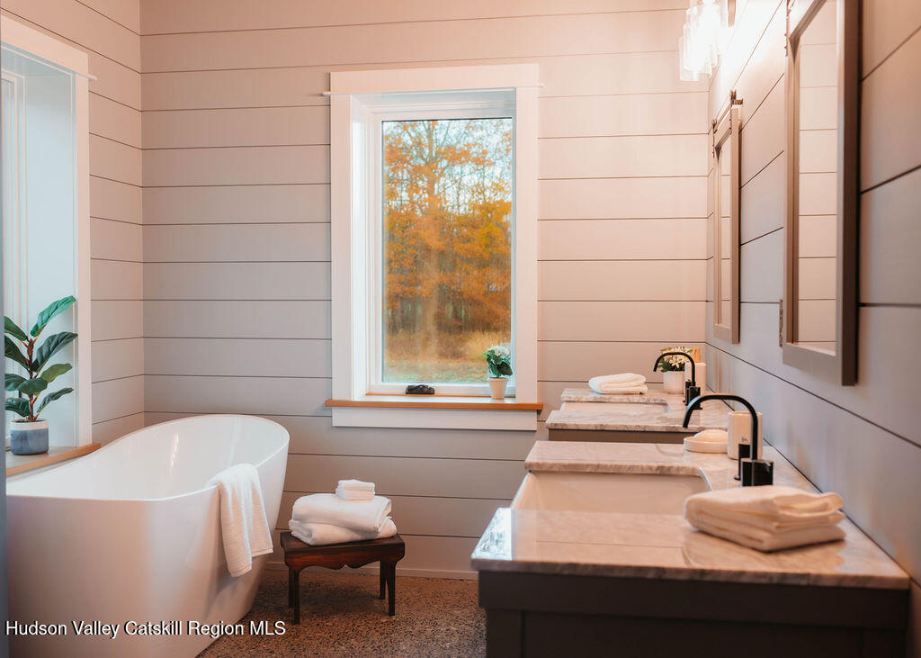 1248 Albany Post Road Gardiner, NY 12525 - Photo 23 of 44 a bathroom with a sink and a bathtub