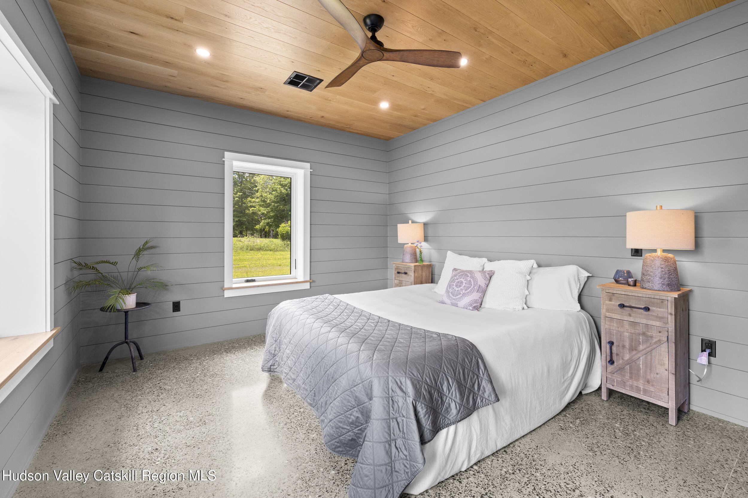 1248 Albany Post Road Gardiner, NY 12525 - Photo 25 of 44 a bedroom with a bed and window