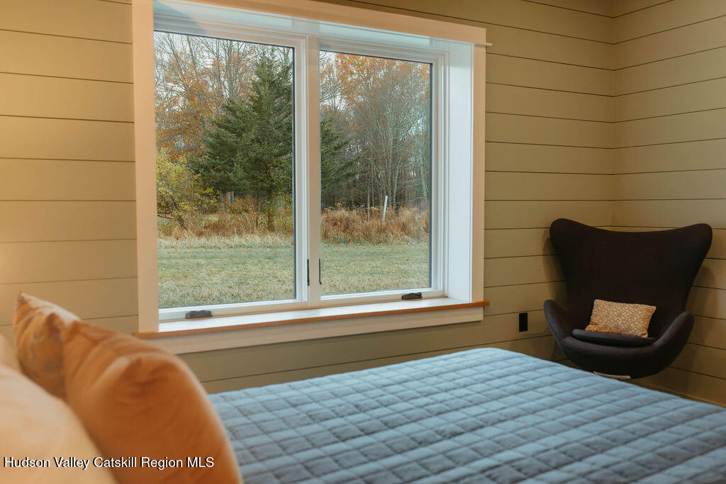1248 Albany Post Road Gardiner, NY 12525 - Photo 27 of 44 a view of a room with a couch and a chair
