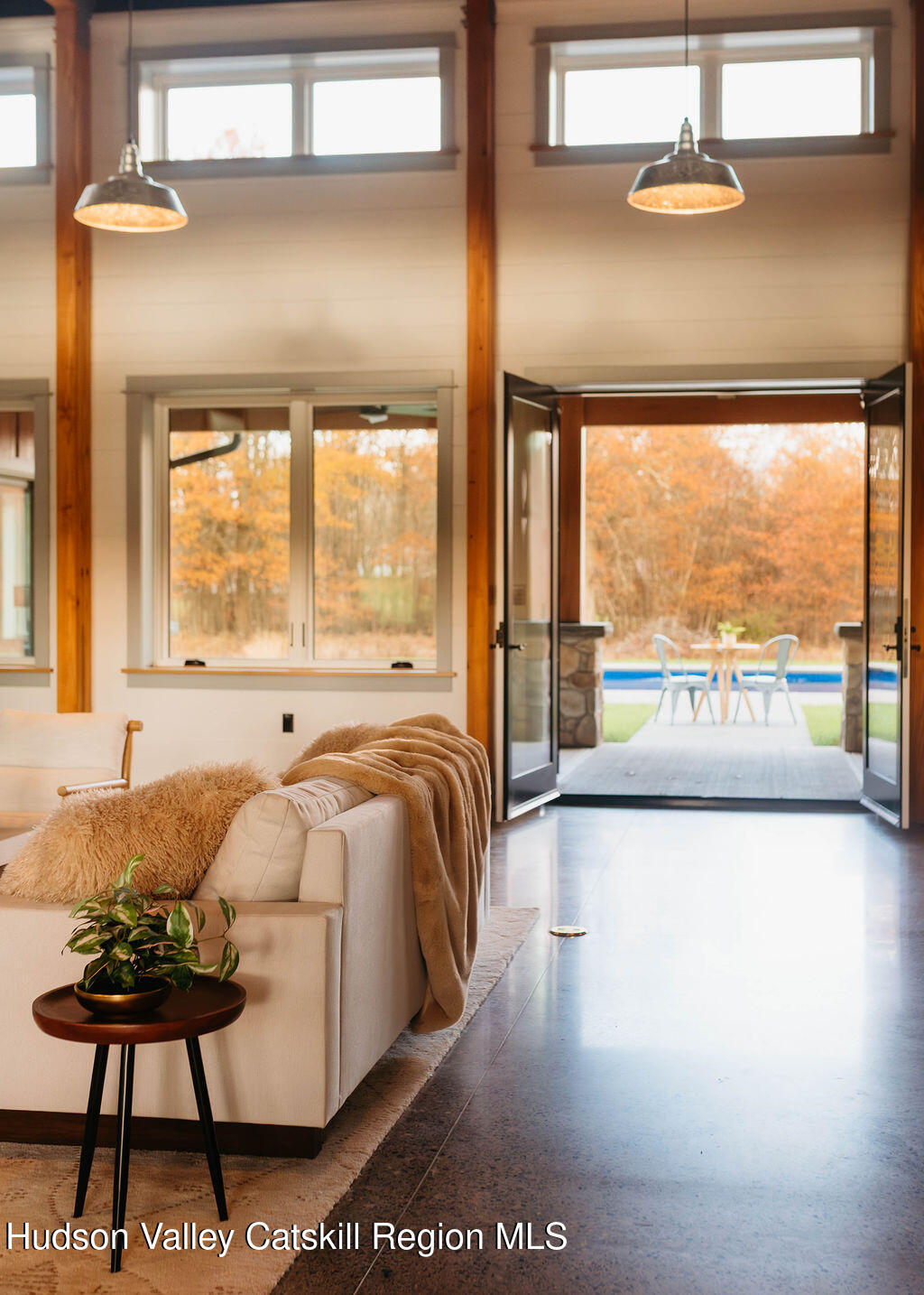 1248 Albany Post Road Gardiner, NY 12525 - Photo 30 of 44 a spacious bedroom with a bed and a large window