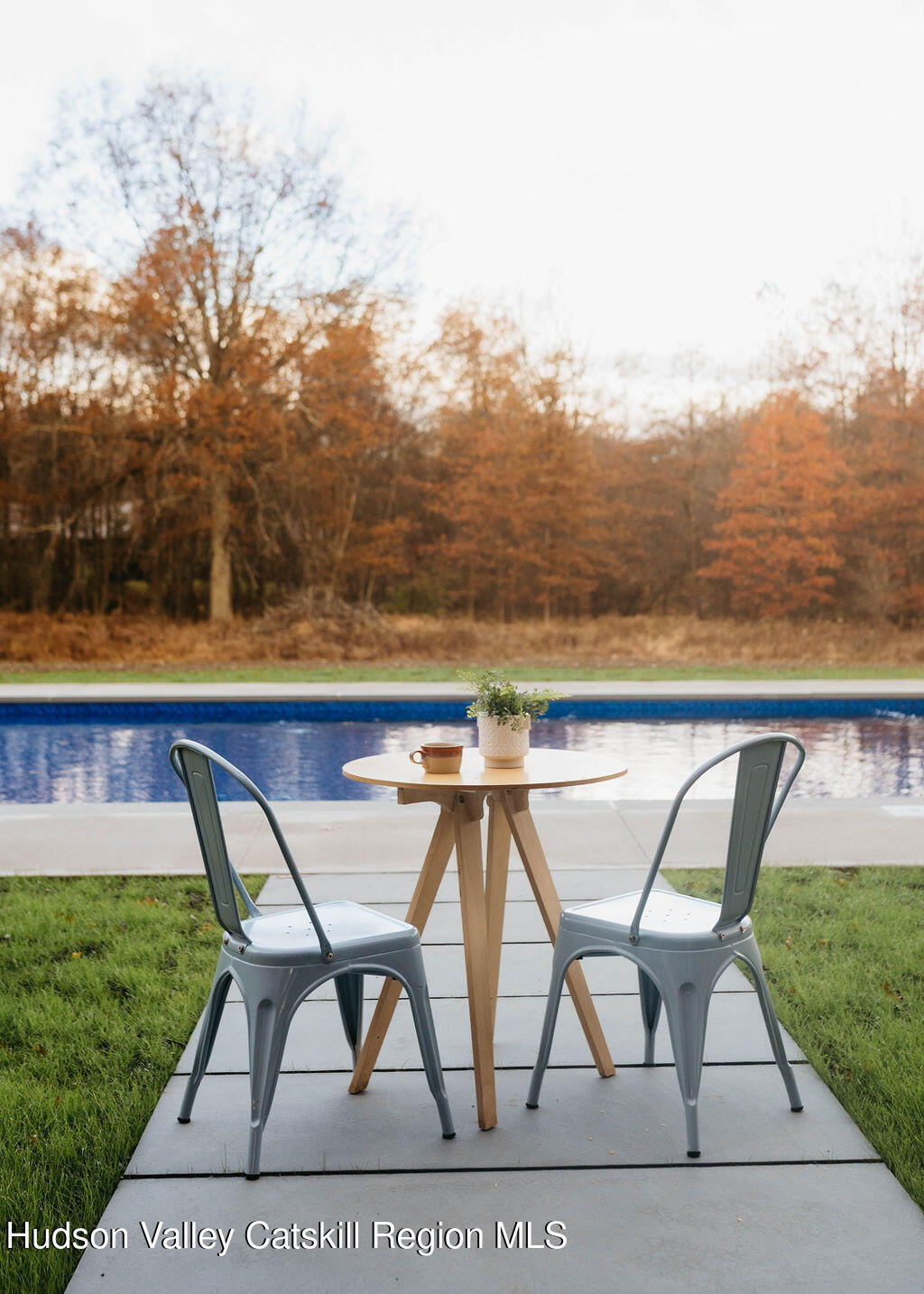 1248 Albany Post Road Gardiner, NY 12525 - Photo 32 of 44 a view of swimming pool with seating space and yard in the back