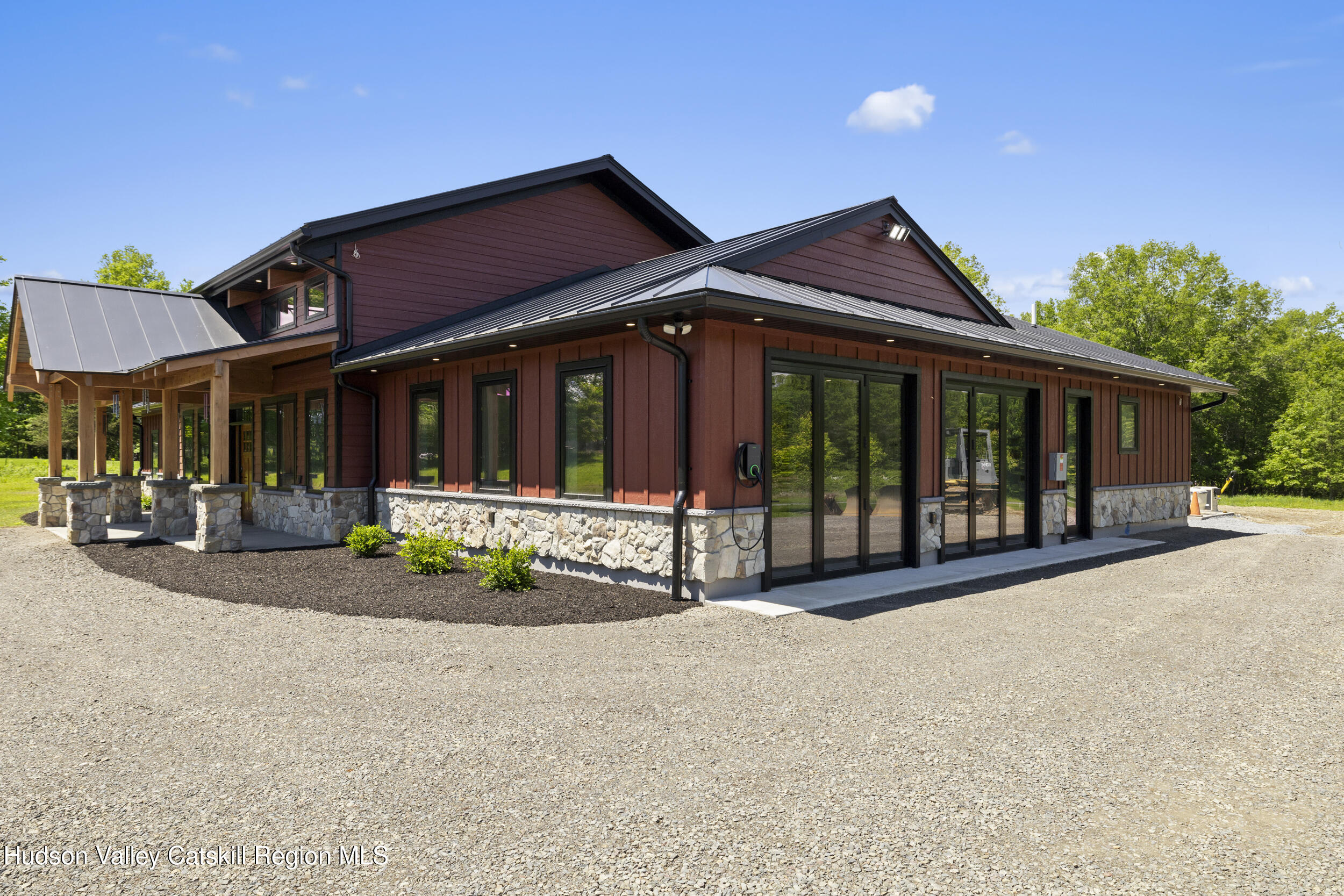 1248 Albany Post Road Gardiner, NY 12525 - Photo 35 of 44 front view of a house with a porch