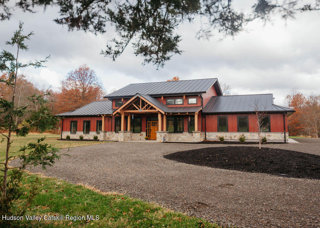 1248 Albany Post Road Gardiner, NY 12525 - Photo 42 of 44 a front view of a house with a yard