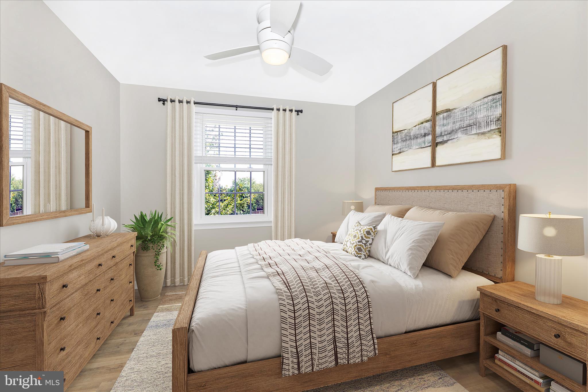 8204 Red Wing Court Frederick, MD 21701 - Photo 20 of 58 a bedroom with a large bed and a window