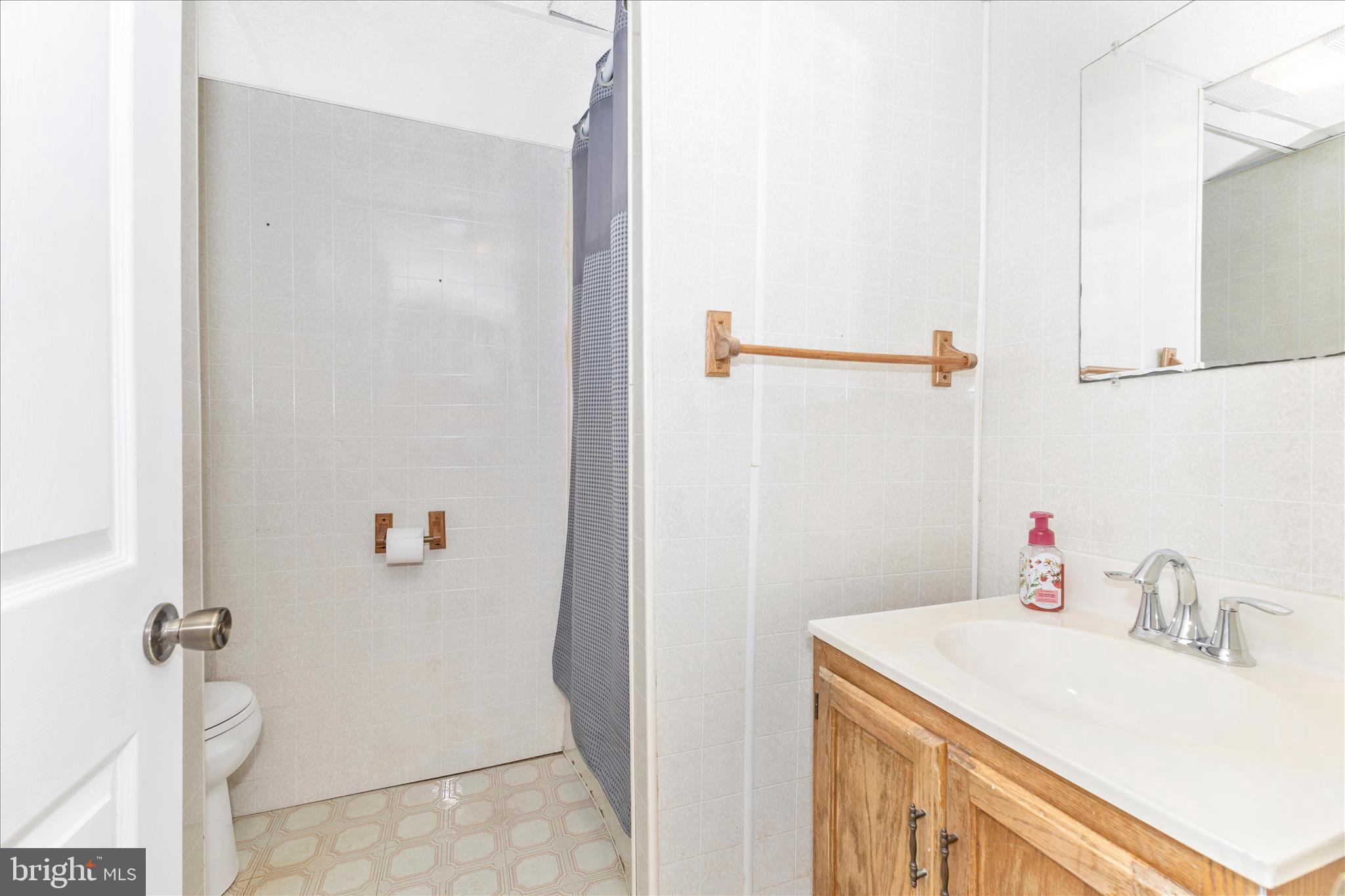 8204 Red Wing Court Frederick, MD 21701 - Photo 27 of 58 a bathroom with a sink and a vanity