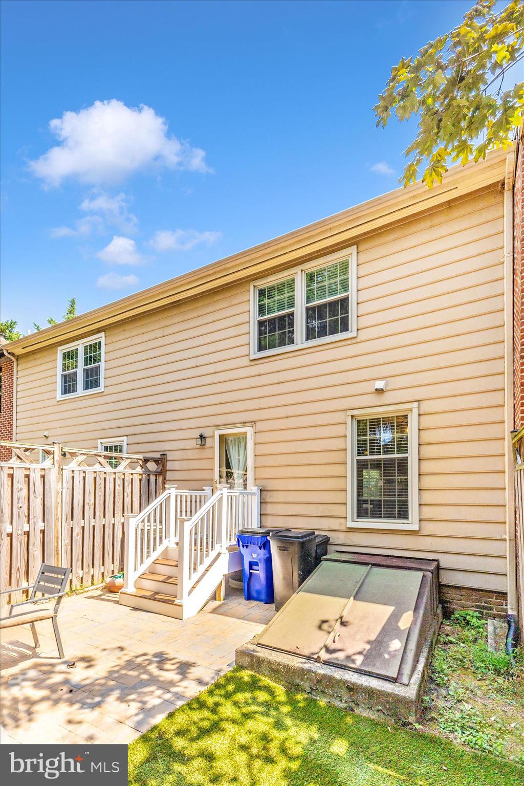 8204 Red Wing Court Frederick, MD 21701 - Photo 33 of 58 a view of a patio with a table and chairs and wooden fence
