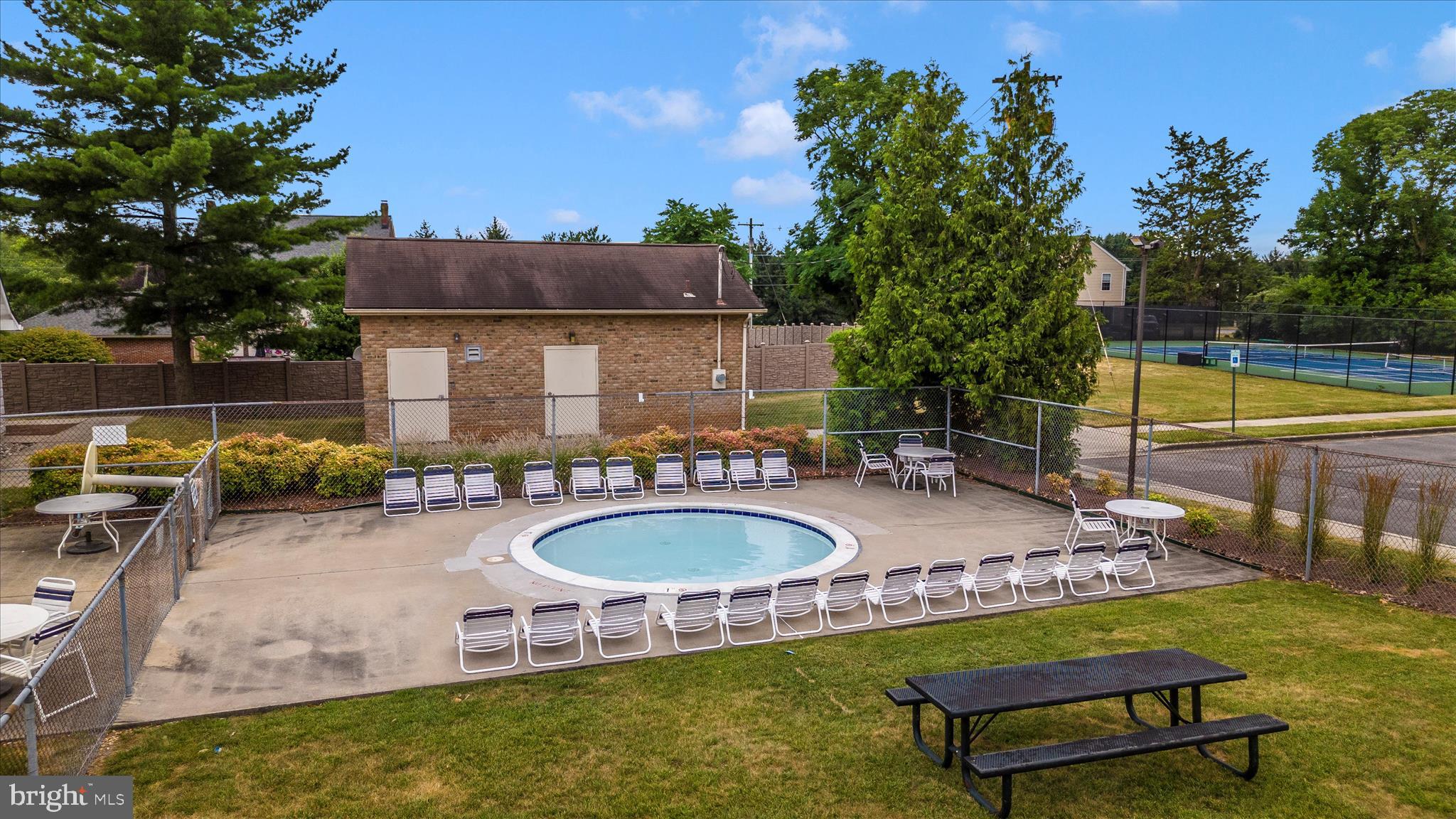 8204 Red Wing Court Frederick, MD 21701 - Photo 41 of 58 swimming pool view with a outdoor seating