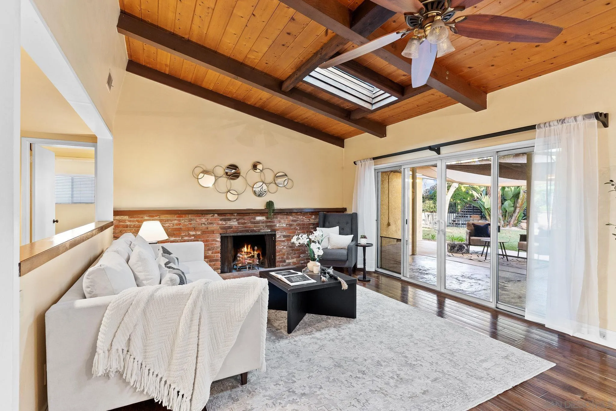 5111 Dorman Drive San Diego, CA 92115 - Photo 13 of 59 a living room with furniture and a fireplace