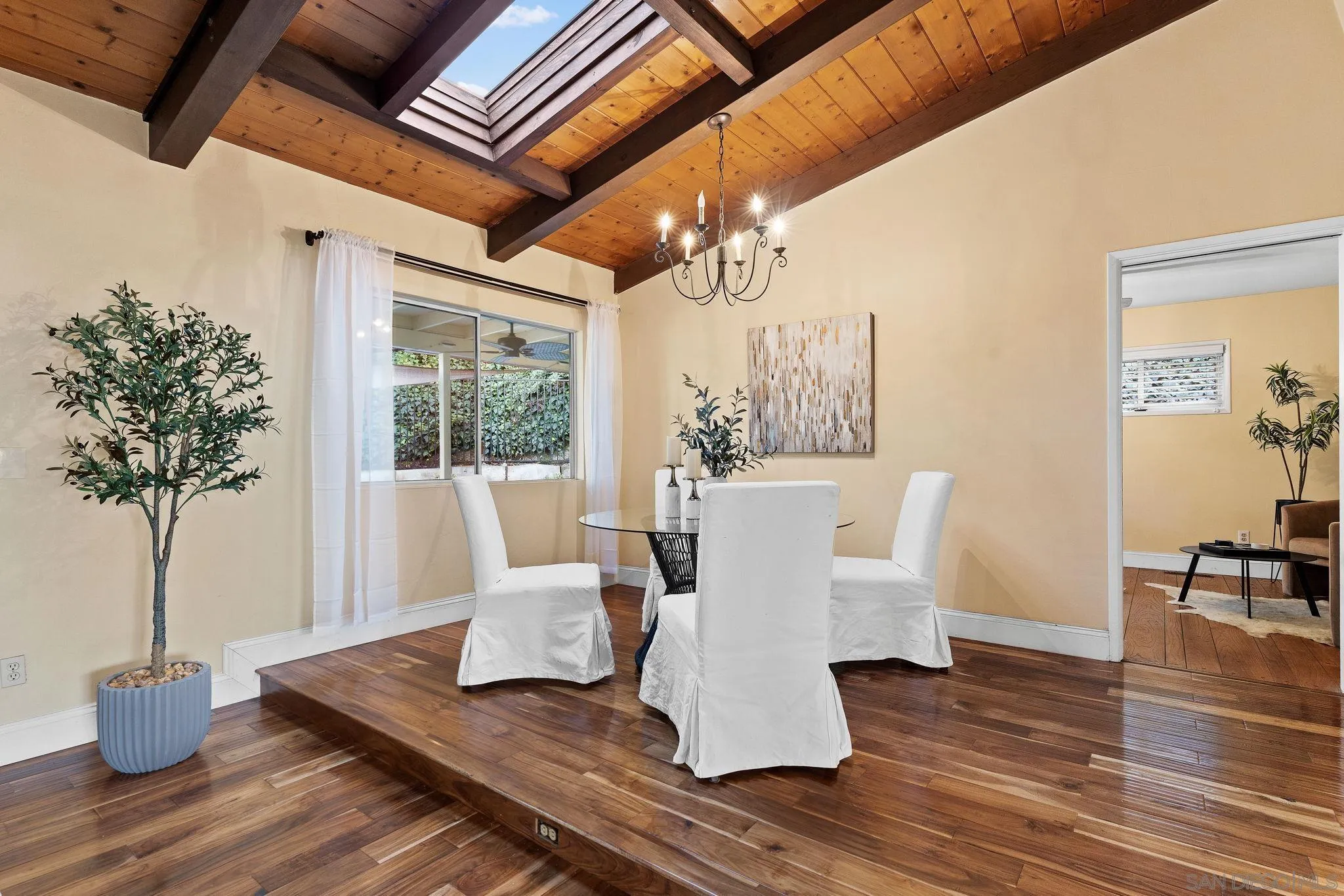 5111 Dorman Drive San Diego, CA 92115 - Photo 14 of 59 a view of a dining room with furniture window and wooden floor
