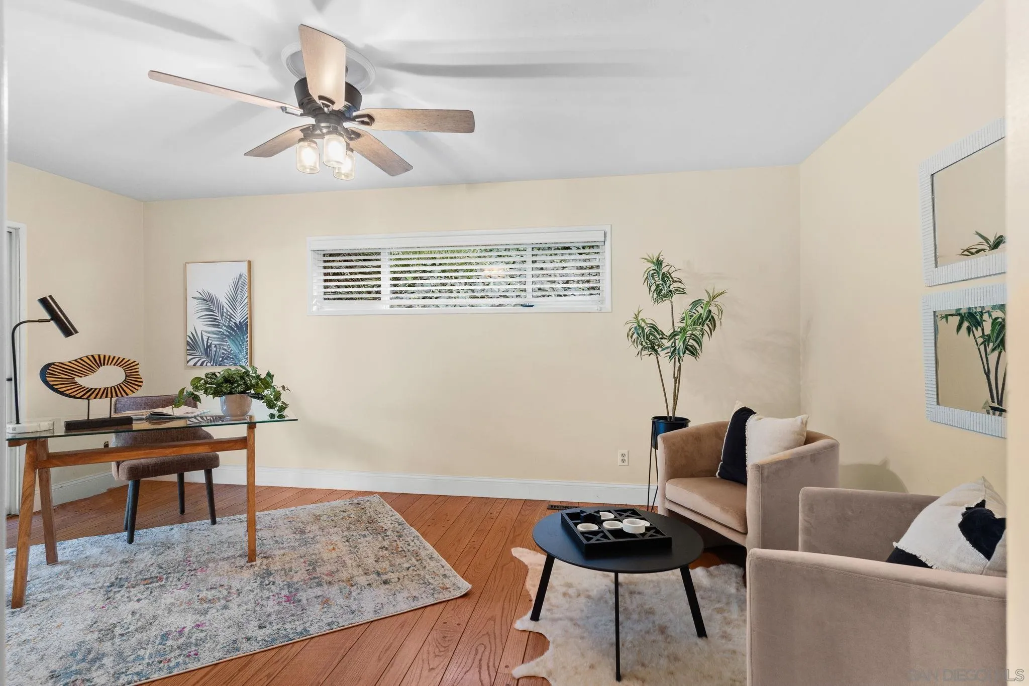 5111 Dorman Drive San Diego, CA 92115 - Photo 19 of 59 a living room with furniture and wooden floor