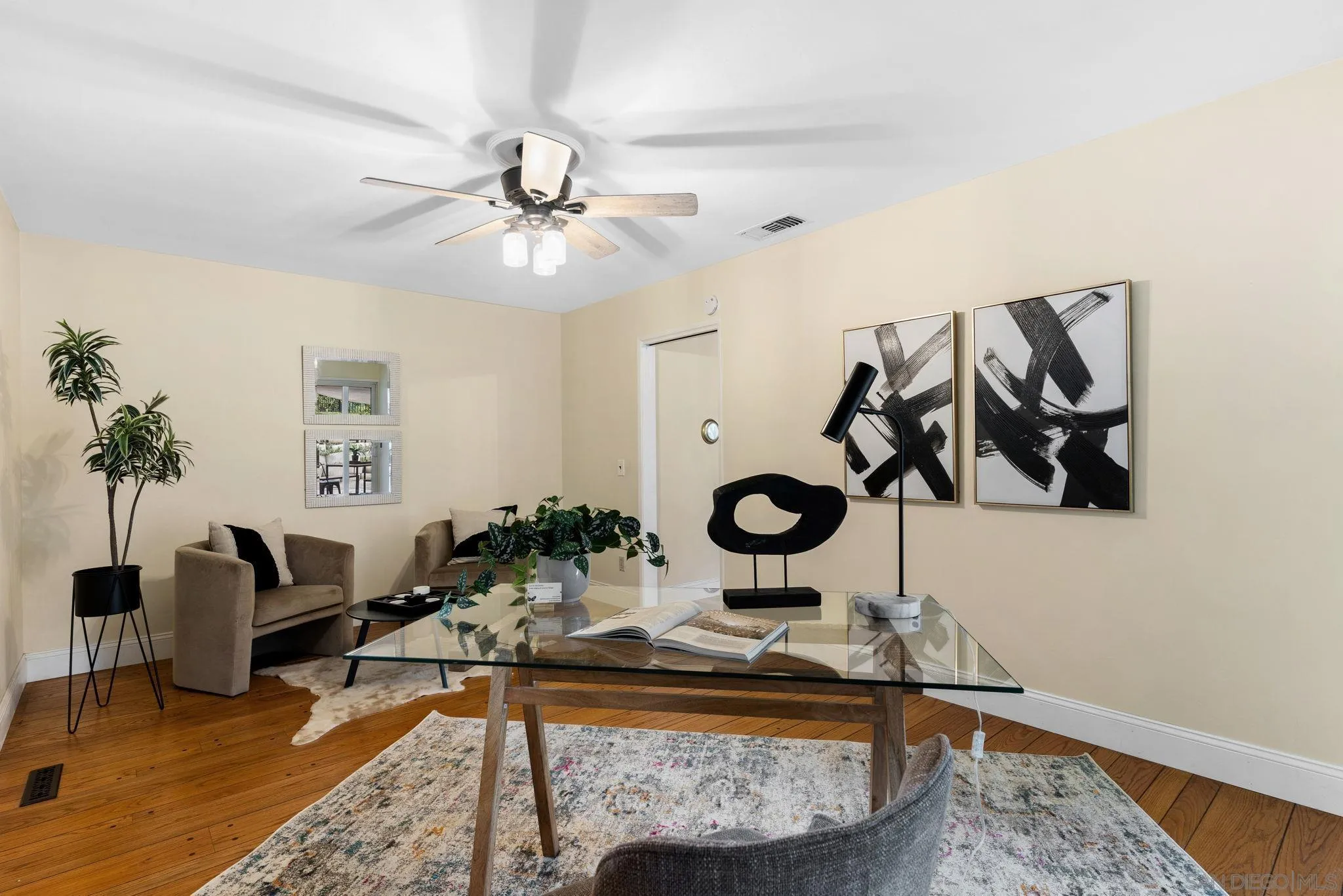 5111 Dorman Drive San Diego, CA 92115 - Photo 20 of 59 a living room with furniture and a rug