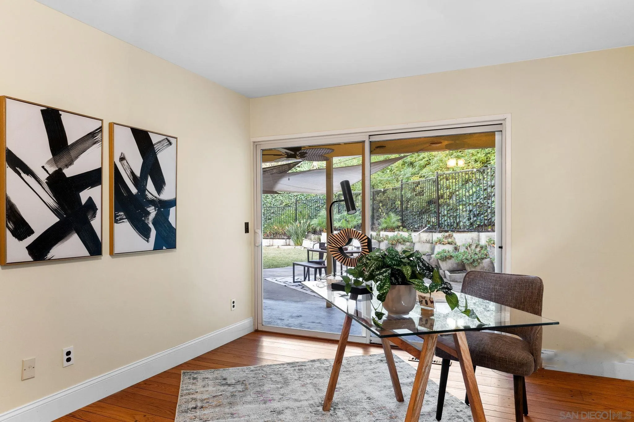 5111 Dorman Drive San Diego, CA 92115 - Photo 21 of 59 a dining room with furniture and wooden floor