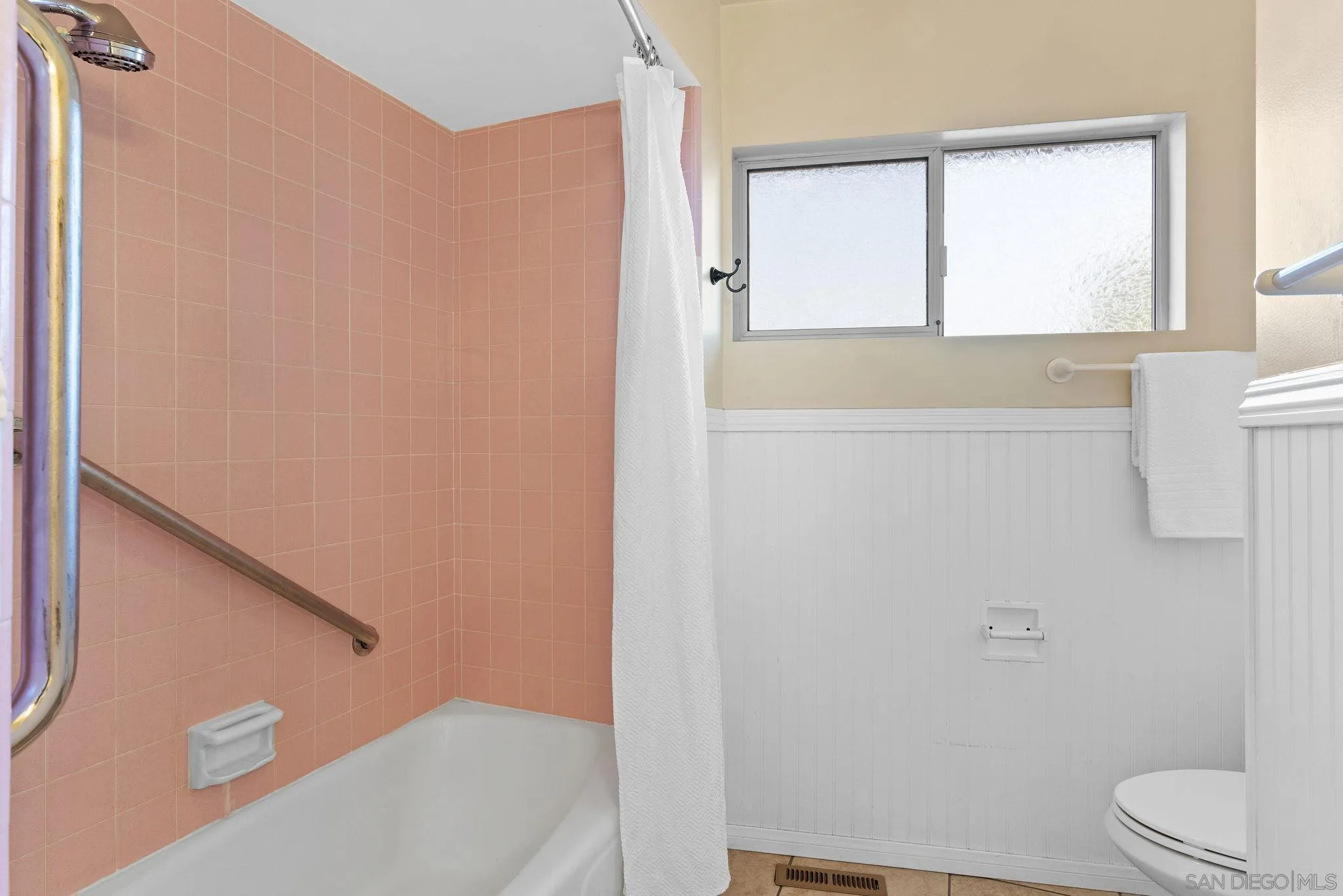 5111 Dorman Drive San Diego, CA 92115 - Photo 26 of 59 a bathroom with a toilet and a sink