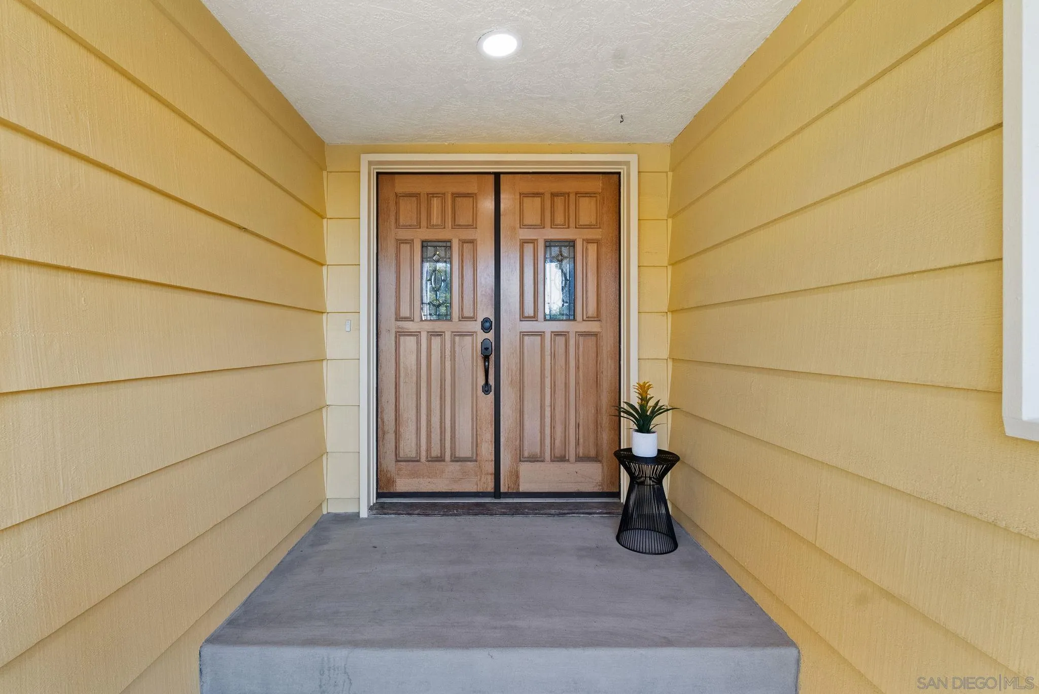 5111 Dorman Drive San Diego, CA 92115 - Photo 3 of 59 a view of a door and wooden floor