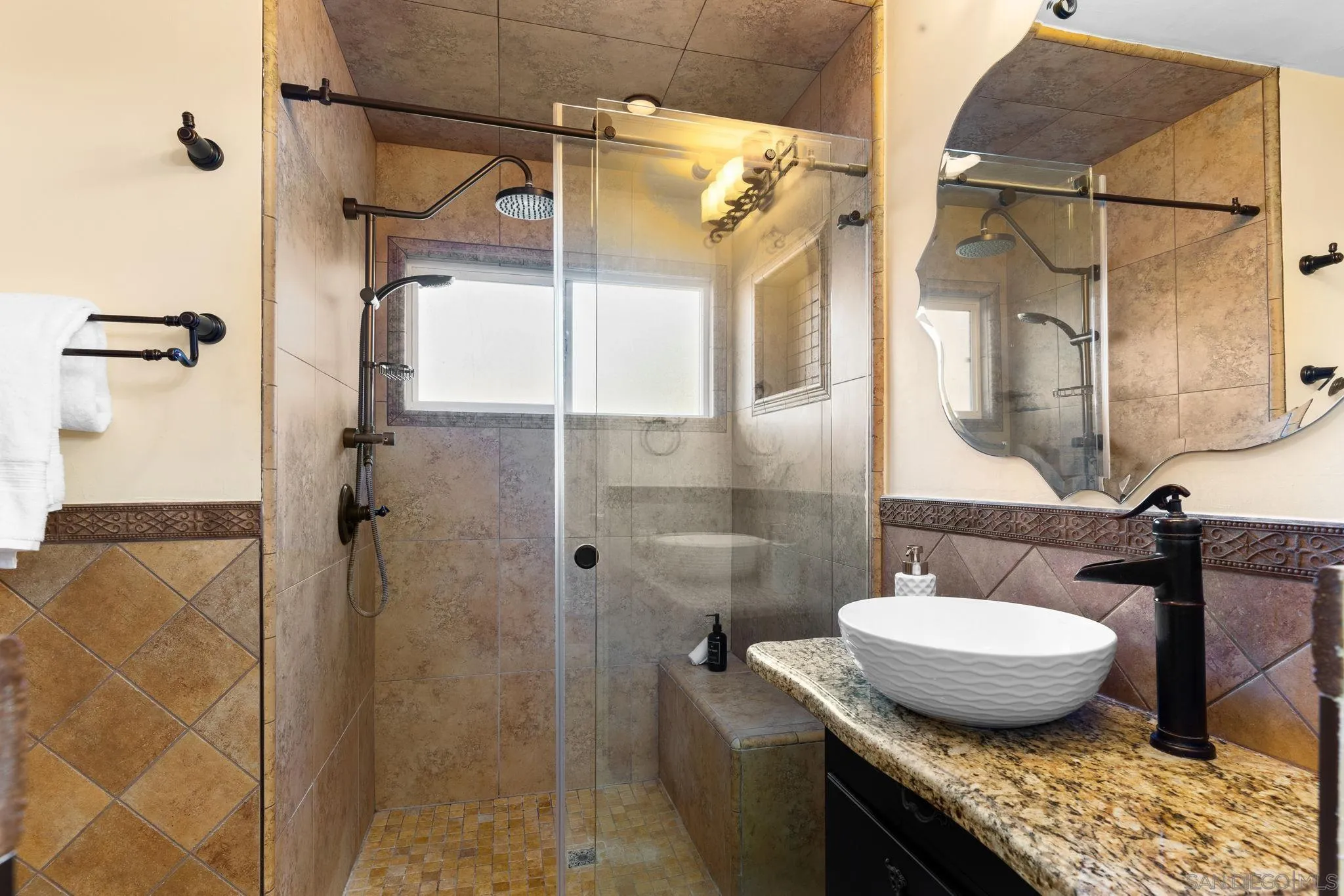 5111 Dorman Drive San Diego, CA 92115 - Photo 31 of 59 a bathroom with a granite countertop sink toilet and shower