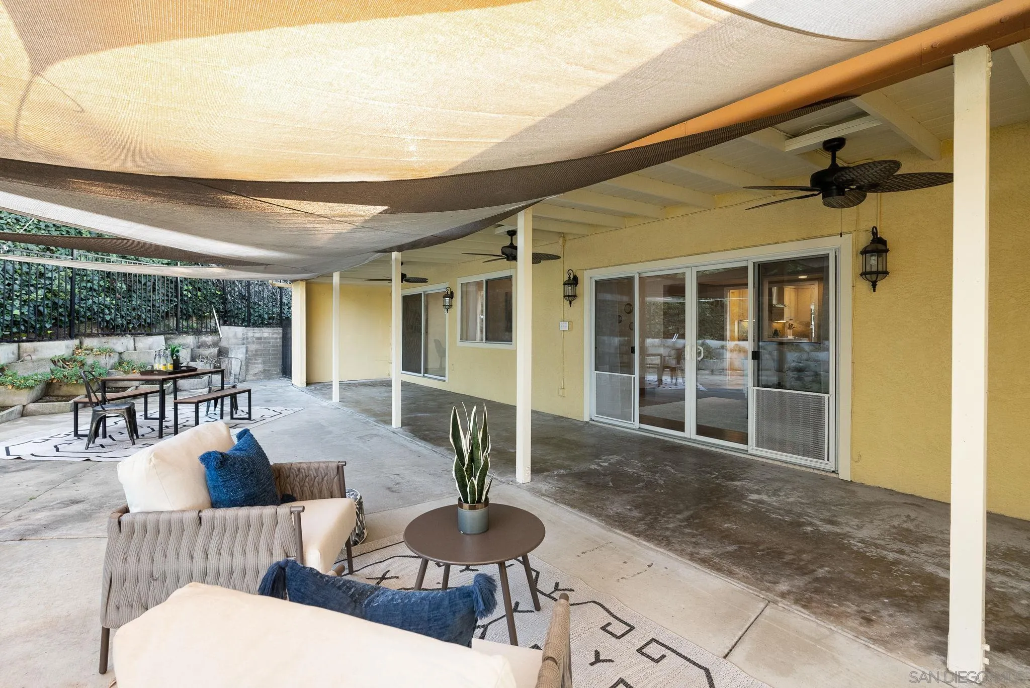 5111 Dorman Drive San Diego, CA 92115 - Photo 37 of 59 a outdoor living space with furniture and a potted plant