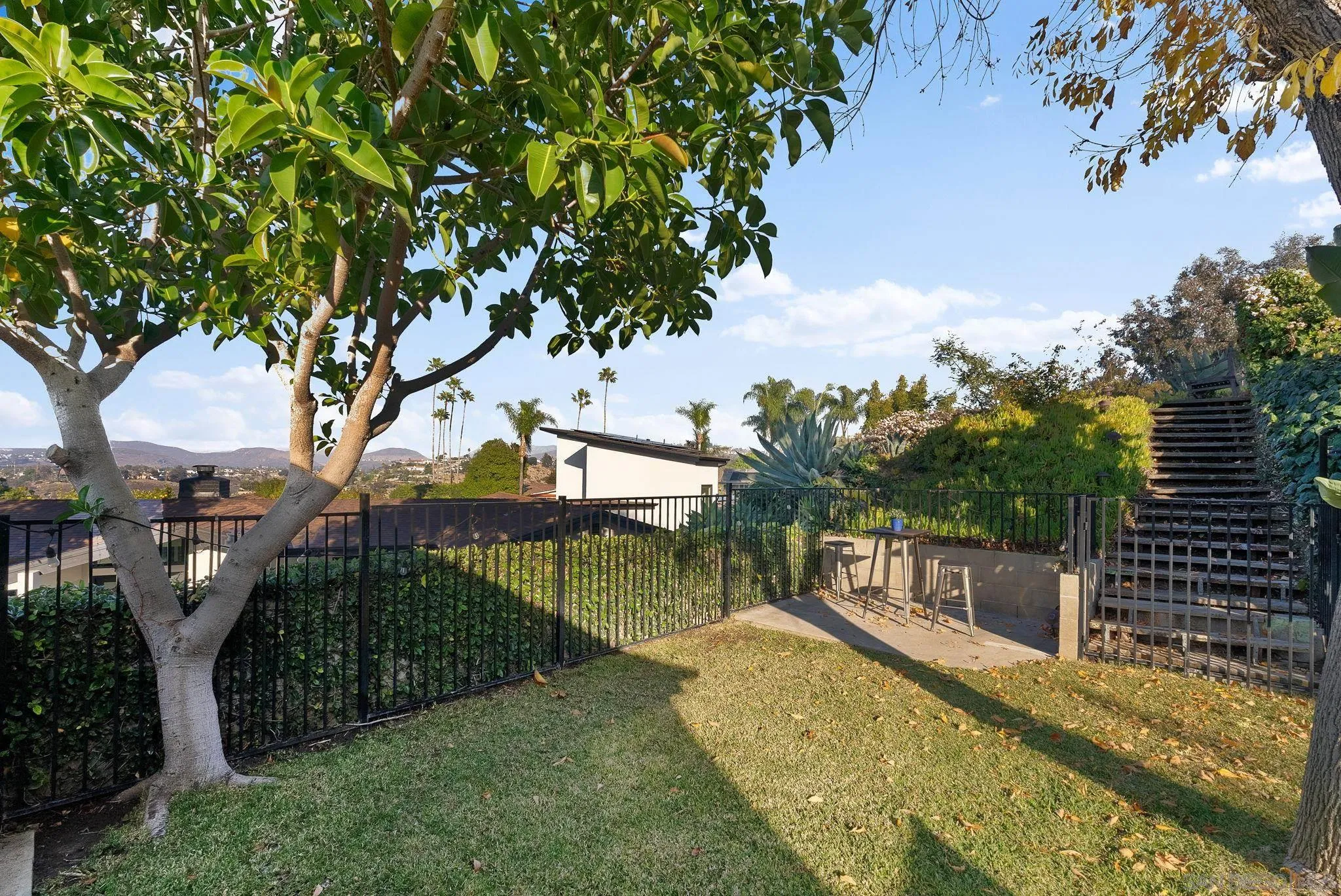 5111 Dorman Drive San Diego, CA 92115 - Photo 42 of 59 a view of a swimming pool with a patio