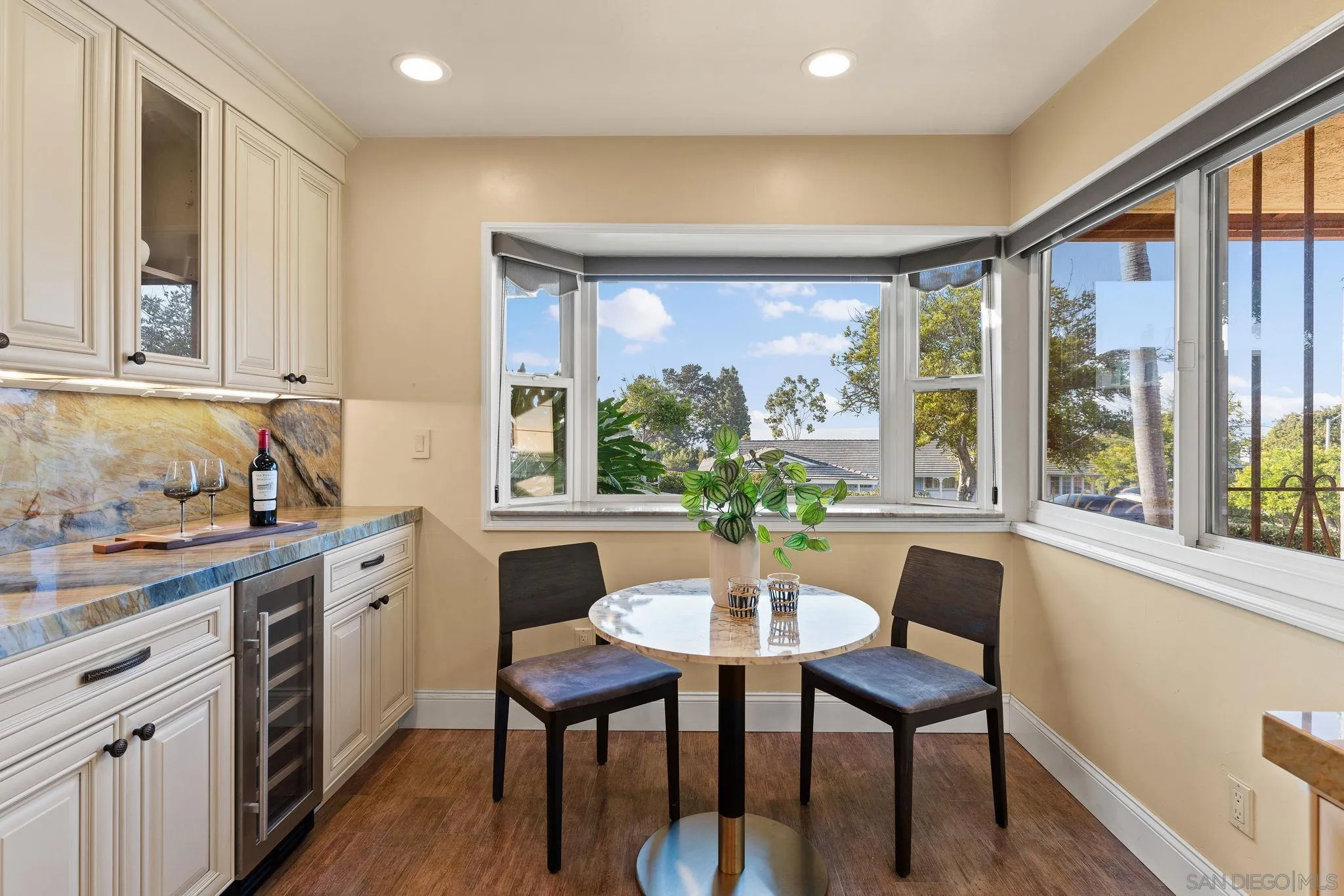 5111 Dorman Drive San Diego, CA 92115 - Photo 9 of 59 a view of a dining room with furniture window and outside view