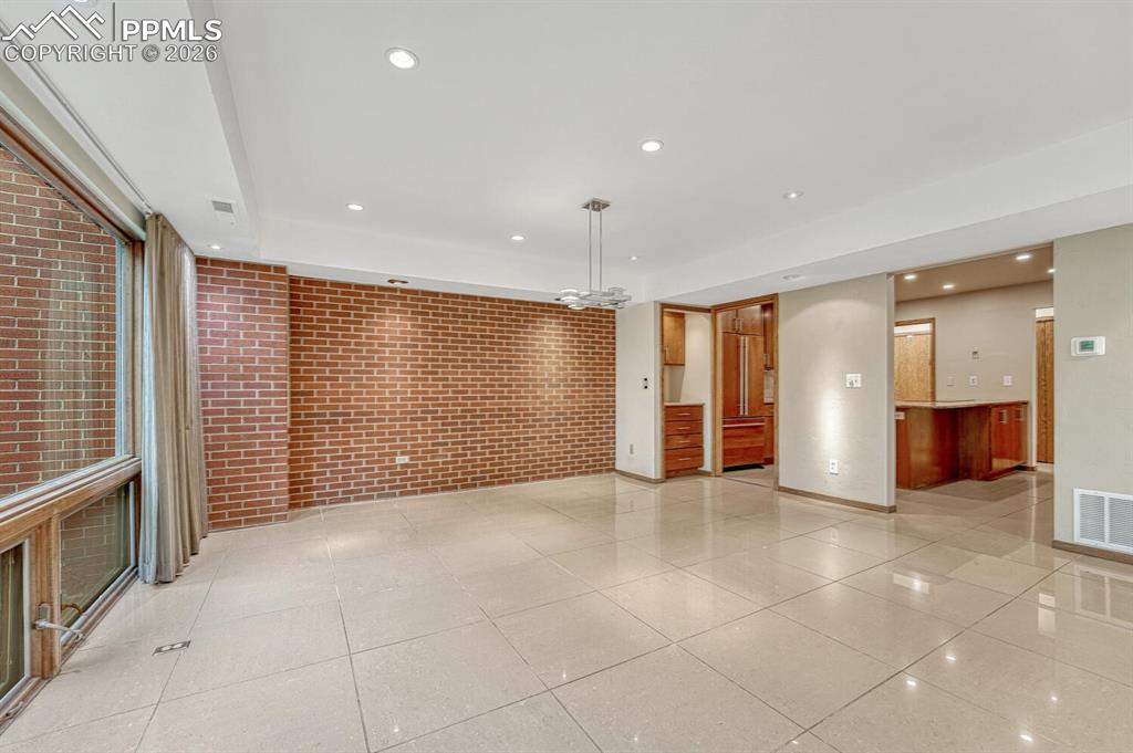 75 East Boulder Street Colorado Springs, CO 80903 - Photo 16 of 50 a view of an empty room with windows