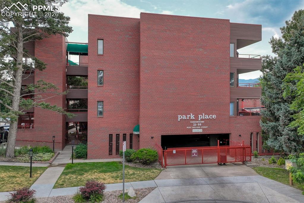 75 East Boulder Street Colorado Springs, CO 80903 - Photo 2 of 50 a building with trees in front of it