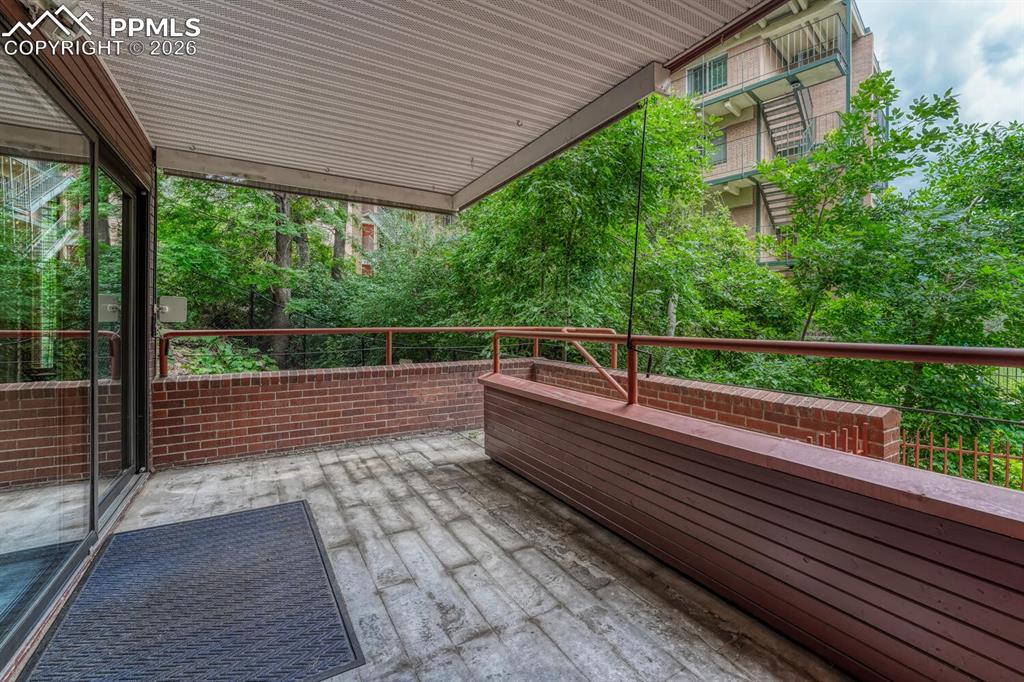 75 East Boulder Street Colorado Springs, CO 80903 - Photo 37 of 50 a view of balcony with wooden floor